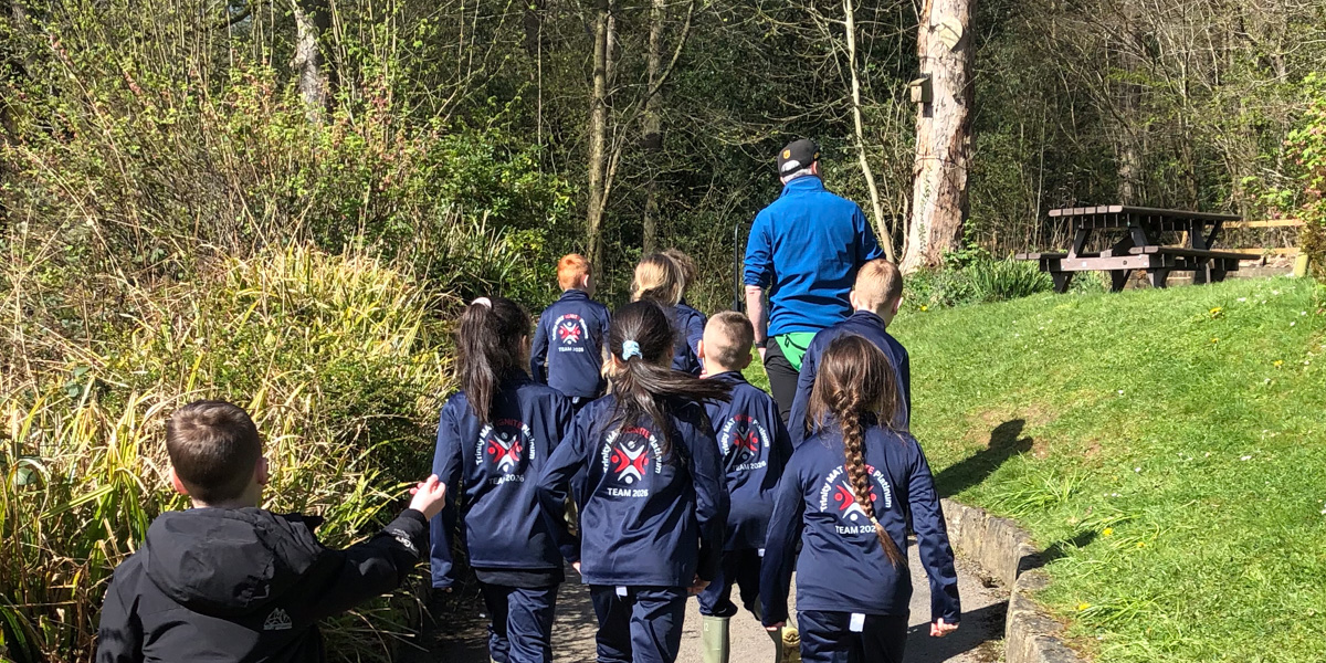 children walking in IGNITE Platinum Primary school enrichment programme uniform