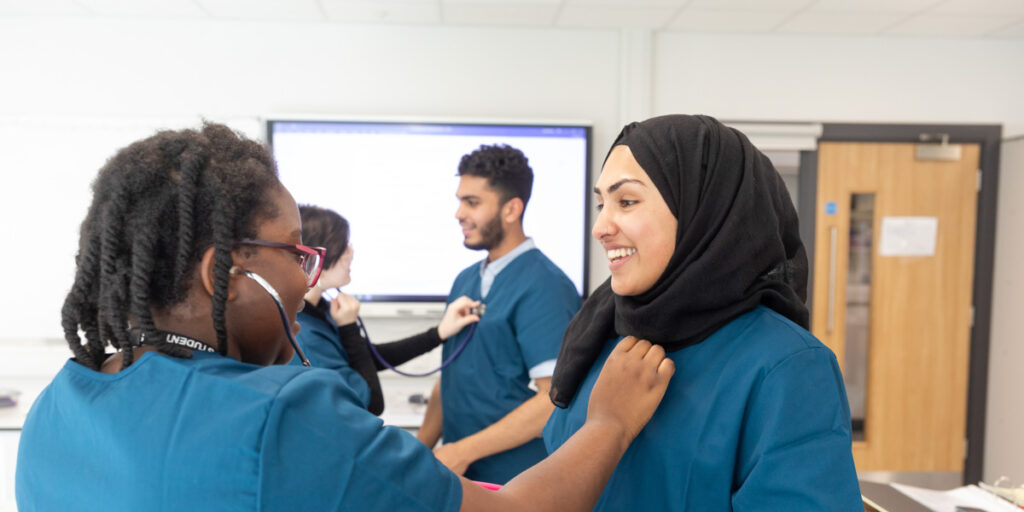 Trinity Sixth Form Academy health care students monitoring heartbeat